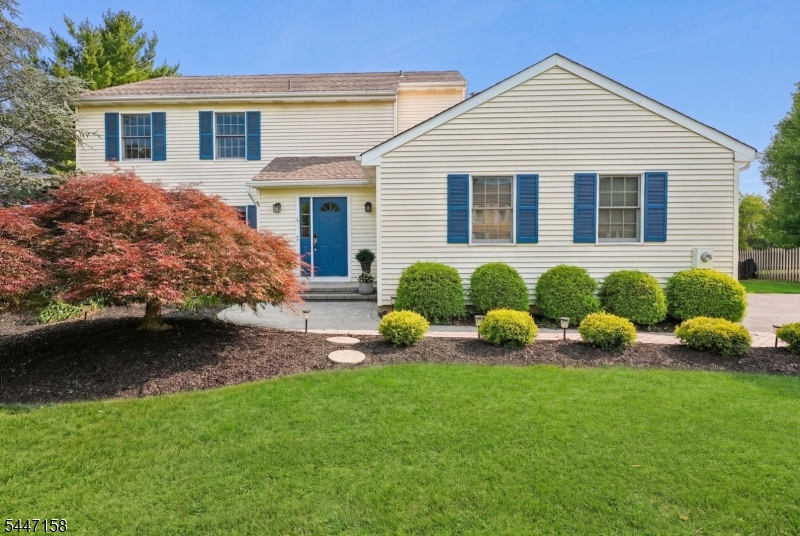 Welcome home to this beautifully updated Colonial situated on a corner lot of nearly 1/2 acre in a highly desirable neighborhood. Offering an ideal blend of space, comfort, and convenience, this home features a spacious floor plan designed for everyday living and entertaining. Step outside to the expansive Trex deck overlooking a large, level backyard with plenty of room for play, gardening, or hosting parties.  The remodeled kitchen is the heart of the home, featuring custom cabinetry, stainless steel appliances, abundant counter space, and an open flow into the living areas. The inviting family room offers a cozy fireplace, while the spacious living room and formal dining room provide additional space for entertaining.  The impressive primary suite is a private retreat with a beautifully remodeled bathroom, a large walk-in closet, and an additional closet. Generously sized guest bedrooms share an updated full bathroom.  The finished lower level provides a huge recreation room perfect for a media room, playroom, home gym, or game room, along with abundant storage space.  Perfectly located just minutes from the charming downtown Flemington area, you'll enjoy easy access to an array of boutique shops, restaurants, caf s, and community events. Commuters will appreciate the convenient proximity to major highways and NYC transportation, making this exceptional home the perfect combination of location, lifestyle, and value.