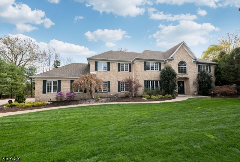 Live the good life at this spectacular 6 BR, 6.5 bath Colonial nestled at the end of a prime cul-de-sac in one of Allendale's nicest neighborhoods. Boasting nearly 5000 sq ft, this home is built for entertaining both inside and out. The star of the show is a stunning heated custom smart pool with 3 waterfalls, spa, & bench seating. Enjoy a cabana with kitchen, full bath, outdoor kitchen/grill, large patio and beautiful perennial plantings. Inside, find an open center hall layout with beautiful hardwood floors, high ceilings, freshly painted interiors & beautiful custom millwork throughout. A stunning custom library is perfect for working from home, and the bedrooms are all generous, providing comfortable space for all. A fully finished lower level contains a playroom, gym, full bath & potential 7th BR. Whole house generator. See brochure for more features. Resort-like living at its best!
