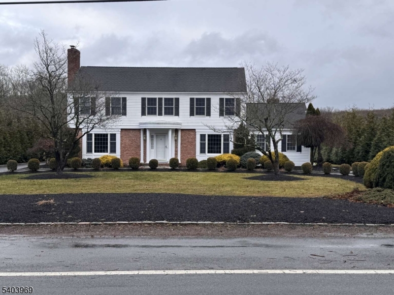 One-of-a-Kind Opportunity in Boonton Township, Morris County, NJ Property of this type is rarely available, this exceptional property offers three buildable lots, including a beautifully maintained residence already situated on one parcel. Located in highly desirable Boonton Township, all three lots have public sewer connections available, and two lots feature existing water wells. The existing home is a classic 2 story center-hall Colonial with a partial basement set on a 0.53-acre parcel, offering four spacious bedrooms and 2.5 baths. The home features a remodeled kitchen, a light-filled sunroom, and inviting living spaces thoughtfully designed for both comfort and style. A small office is located just off the kitchen Outdoors, enjoy landscaped grounds, an in-ground pool, and a two-car detached barn-style garage, creating an ideal setting for relaxation and entertaining. Adding to the property's uniqueness is a private lake located on its own 5.08-acre parcel, along with an additional connected 1.09-acre lot, offering remarkable flexibility and privacy. The property may be preserved as a private estate or offers excellent development potential. Public sewer and natural gas are already in place, enhancing both convenience and value. Ideally situated in a prime Morris County location and directly across the street from a grammar school, also located within the Mountain Lakes School district. This is a truly rare opportunity with endless possibilities.
