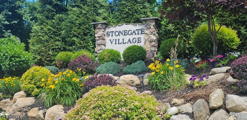 Move right into this renovated 2nd floor condo in the Stonegate community! This one floor unit features an open floor plan with a spacious living/dining room combo that leads to a large deck. Modern kitchen with granite countertops tiled backsplash and luxury vinyl flooring. The unit also includes an updated full bathroom with shower/tub and in-unit laundry for convenience. Additional storage can also be found on the ground floor. Amenities include pool and tennis courts! Close to major highways and shopping. Deck to be freshly painted in next 2 weeks!