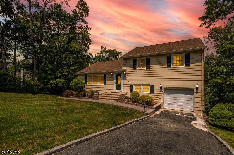 Peaceful, warm and inviting home located in the Cedar Knolls section of Hanover Township features 3 bedrooms. Sought-after location known for its low taxes & excellent schools. Walk to Malapardis Park where you can enjoy the playground, ball fields & a spot to picnic. Offering an eat-in kitchen with SS appliances, formal DR & spacious LR. Upstairs you will find the MB, full bath & 2 good-sized bedrooms. Ground level offers a family room, bath, laundry & access to garage.HW throughout. Oversized garage. Township has a beautiful town pool, community center, before/after school programs. Minutes away from Morris Plains station with NYC Midtown Direct Train. Convenient to major highways.      Seller's are motivated for a contract.  The price is negotiable - bring in all offers