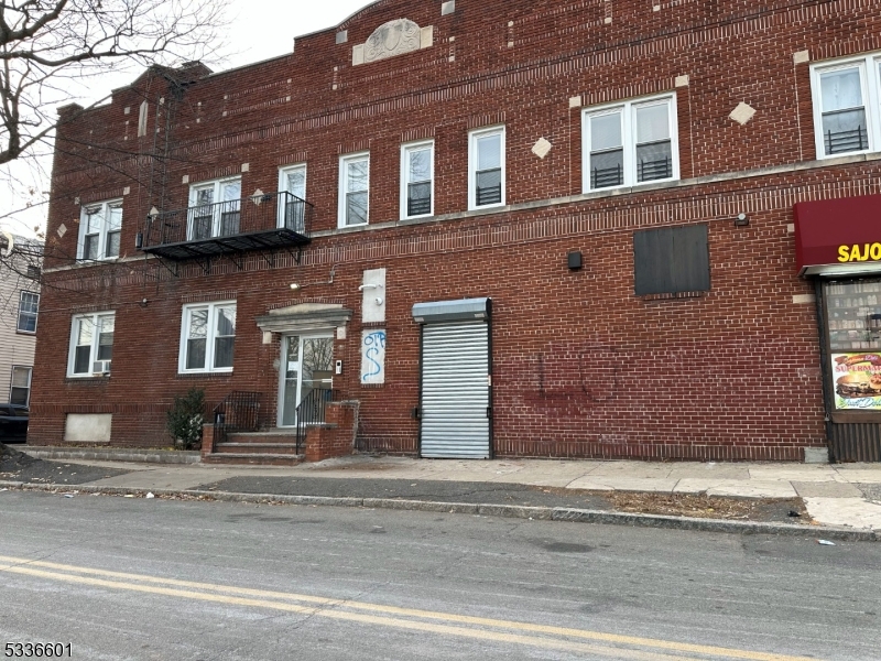 This prime mixed-use building features 7 spacious apartments (2, 3 bedroom layouts) and a versatile retail space, currently rented as lucrative convenient store. This wonderfully maintained all brick two- story mixed use building, characterized by its unique architectural features comprising a total of seven apartment units, each residence offers ample living space thoughtfully renovated to align with modern living concepts, complete with 6- two bedrooms and 1-three bedroom with one full bath respectively. The kitchens are equipped with stainless steel appliances and seamlessly flow into spacious living and dining areas. For added comfort, central air conditioning is provided in each unit. Located in vibrant East Orange neighborhood with high foot traffic, conveniently located to major transportation services. This building is a strong income producing asset.