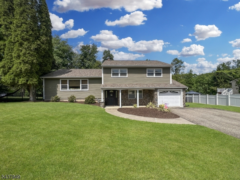 Move right into this beautifully updated split level home offering the space, upgrades, and convenience that you have been looking and waiting for. The heart of the home is the upgraded kitchen, featuring granite countertops, stainless steel appliances, and plenty of cabinet space for everyday living and entertaining. Generous room sizes throughout provide a comfortable and flexible floor plan, while the spacious primary bedroom includes the added convenience of a private half bath and walk in closet. Newer mini-split systems deliver incredible cooling during the summer months along with efficient supplemental heat in the winter. Step outside to enjoy the fully fenced backyard which is perfect for pets, play, or simply relaxing in your own private outdoor space. The large deck off of the kitchen is ideal for hosting friends or enjoying a quiet evening at home. Additional highlights include a newer roof, attached one car garage, oversized driveway with plenty of parking, and public water and sewer. All of this is located within a highly regarded school district and close to shopping, dining, parks, and major commuter routes. A wonderful combination of modern updates, practical features, and everyday comfort makes this home one you won't want to miss.