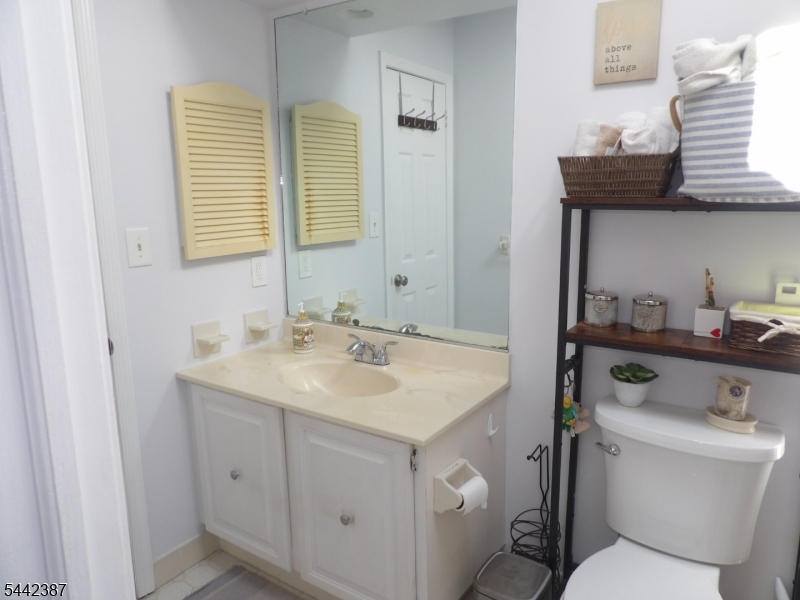 The well-maintained Town house features 2 bedrooms, 1.5-baths, a bright and inviting formal dining room, beautiful hardwood floors , A/C force hot air. convenience of an in-unit laundry room. Spacious kitchen, attic with extra space for storage and stairs to access it. Enough parking space, newer roof (8/2025). Surrounded by green areas. Located in one of the area's most sought-after neighborhoods, with a desirable location close to top-rated schools (JMI, JAMS, JPS and private too) as well as a commuter friendly. Near Metro Park Train Station, hospitals, malls, dinings, and major highways. A wonderful opportunity! You won't want to miss.