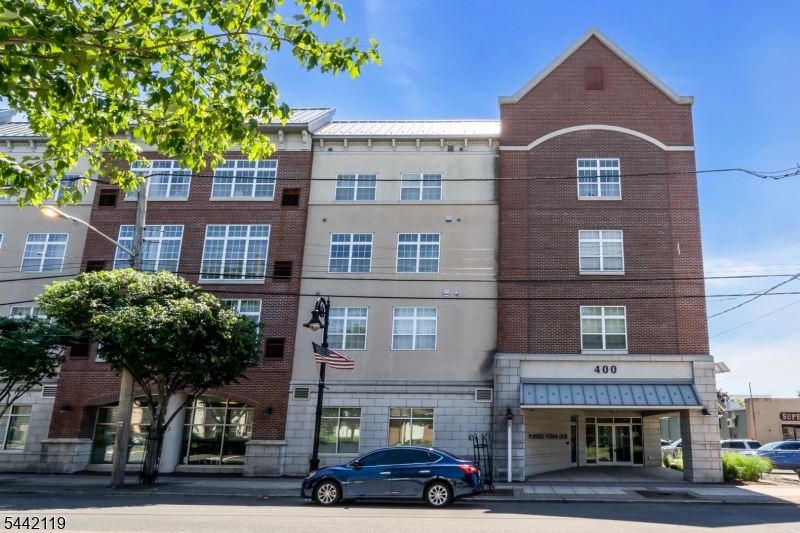 Beautifully clean two bedroom, two bath unit on the top floor of a very well maintained elevator building. Laundry in unit. Newer floors, bright and sunny open floor plan, gorgeous bathrooms. Units in this building are built to be easily ADA adaptable if not fully compliant. Assigned parking, in a covered parking deck. Great clostes, lots of storage space. Just under a half mile to the train station. Controlled Access to the building with Key Fob entry.