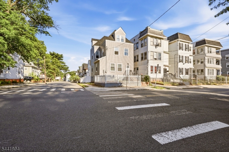 Welcome to 44 Fabyan Pl, a beautifully renovated single-family home offering modern finishes, stylish design, and generous living space in Newark. This inviting home features three spacious bedrooms, two full bathrooms, and one half bathroom, beginning with a bright living room, a formal dining room, a stunning kitchen highlighted by beautiful countertops, brand-new stainless steel appliances, and a separate dining area perfect for everyday living and entertaining, along with a convenient half bathroom on the first floor. The second floor offers two well-sized bedrooms and two full bathrooms, including a spacious primary suite featuring its own private full bath and a walk-in closet. The third floor includes an additional bedroom and a sitting room, providing flexible space ideal for a home office, den, or recreation area. A finished basement adds even more functionality with a laundry area and versatile space for recreation, storage, or everyday use. Outside, the property offers exclusive parking for up to six vehicles, a rare convenience in Newark. With its thoughtful renovations, modern finishes, and flexible layout, this move-in-ready home is a standout opportunity. Grab it before it's gone!