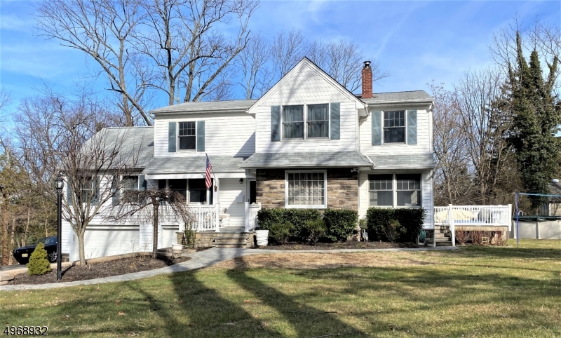 BEAUTIFUL & CONVENIENT best describes this custom home with stunning interior, over-sized rooms, exquisite kitchen with island, H/W floors, plenty of parking & minutes to highways, train & shopping. Ideal Quarantine Home! Gym in Basement, Hot Tub on Deck & Pool in yard.  Be awed as you enter this beautifully designed & decorated home. Gather at kitchen island for informal meals or dine in elegance in formal DR.  Relax by fire in LR or enjoy a movie as you enter through french doors to the Great Room. Plenty of light shines in 1st floor Sun Room and Laundry Room.  Master Bed offers sitting area, walk-in closet & master bath.  Large full basement is ideal for storage or maybe added living space.  This well appointed home is sure not to disappoint your fussiest buyers.