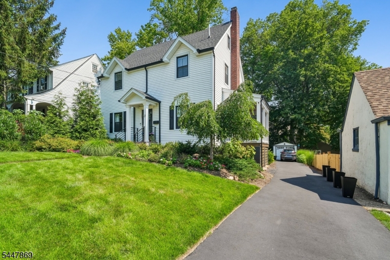 Brilliantly Blending Modern Luxury with Vintage Charm- Beautifully Rebuilt/Remodeled in 2022 with 6 Bedroom/4.1 Bath! This home checks every box! Featuring Open-Concept Chef's Kitchen, a Screened-In Porch, Expansive Outdoor Patio. Four Floors of Fabulous, Move-In-Ready Living Space Feature: NEW Windows, Electrical, Plumbing, Heating, Roof + 2 HVAC units for Total Peace Of Mind! Pristine Hardwood Floors, Freshly Painted, Modern Open Layout Enhances The Stunning 1st fl Heart of the Home Open Kitchen-Family Room: Oversized Island with Dual-Sided Cabinets, Cultured Marble Countertops, + a Cozy Gas Fireplace Anchor the Open Floor Plan. A Screened-In-Porch + Dining Rm w Wine Fridge/Bar is Perfect for Dining + Entertaining, while Sliding Glass Doors Open to Rear Patio w Dedicated BBQ Area. Lush Plantings Make the Private Yard Effortless to Enjoy Year-Round. Custom Mudroom + Powder Rm Round Out  Fab Layout.The 2nd fl Primary Suite Boasts 2 Walk-In Closets, Soaking Tub, Stall Shower, Double Vanity. 3 addl 2nd fl Bdrms + a Hall Bath. The 3rd Level Adds 2 bedrooms, (WFH Office/Bedrms) + a stylish full bath. The Finished LL Offers: Rec Room/Gym, Laundry, Full Bath + Storage. Evergreen Bonus: Beloved Neighborhood Traditions include: 4th of July + Blocktoberfest block parties! Minutes to BOTH Maplewood + South Orange Villages, NYC direct trains, (Jitney Stop on Wyoming- 5 houses away), Parks, Schools, Restaurants! Perfect Blend of Remodeled Polished Details with Sparkling Sophistication.