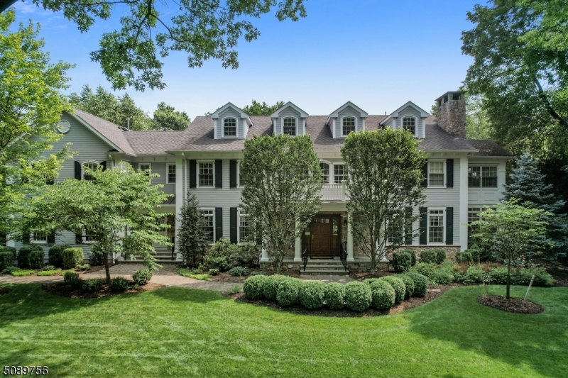Lifestyle and luxury blend perfectly in this 6 bedroom, 6.2 bath custom Colonial that enjoys a prime location in the prestigious Rolling Hill neighborhood of Chatham resting on .84 private acres. Enjoy four levels of living space with impeccable attention to detail & an open floor plan. The 1st floor boasts a chef's kitchen with top of the line appliances opening to a breakfast room & family room with fireplace, a beautifully paneled library with fireplace, office, formal dining room, living room with fireplace & mudroom. Six bedrooms are nestled on the 2nd level & the master suite is sure to impress! A bonus room on the 3rd floor, finished lower level with home theater, exercise room, bedroom, 2nd kitchen & wine cellar.  Fabulous outdoor space with pool, expansive lawn, patio & 3 car heated garage.