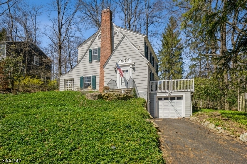 Looking for charm, privacy yet closeness to everything - this is it!!  Short distance to Morristown Green!  Be prepared to fall in in love with this full of character colonial featuring high ceilings on the first floor, large windows as well as two French Doors leading to a charming covered side porch!  Large living room with wood burning fireplace; formal dining room; tasteful kitchen with breakfast bar, pantry, and stainless steel appliances; updated powder room will impress you.  Second floor offers three bedrooms and a full bath.  Hardwood floors throughout first and second floor except for baths.  Full basement with office, laundry room, utility/ storage room, newer a/c, large yard with beautiful patio complete the picture!!  Come and stay!