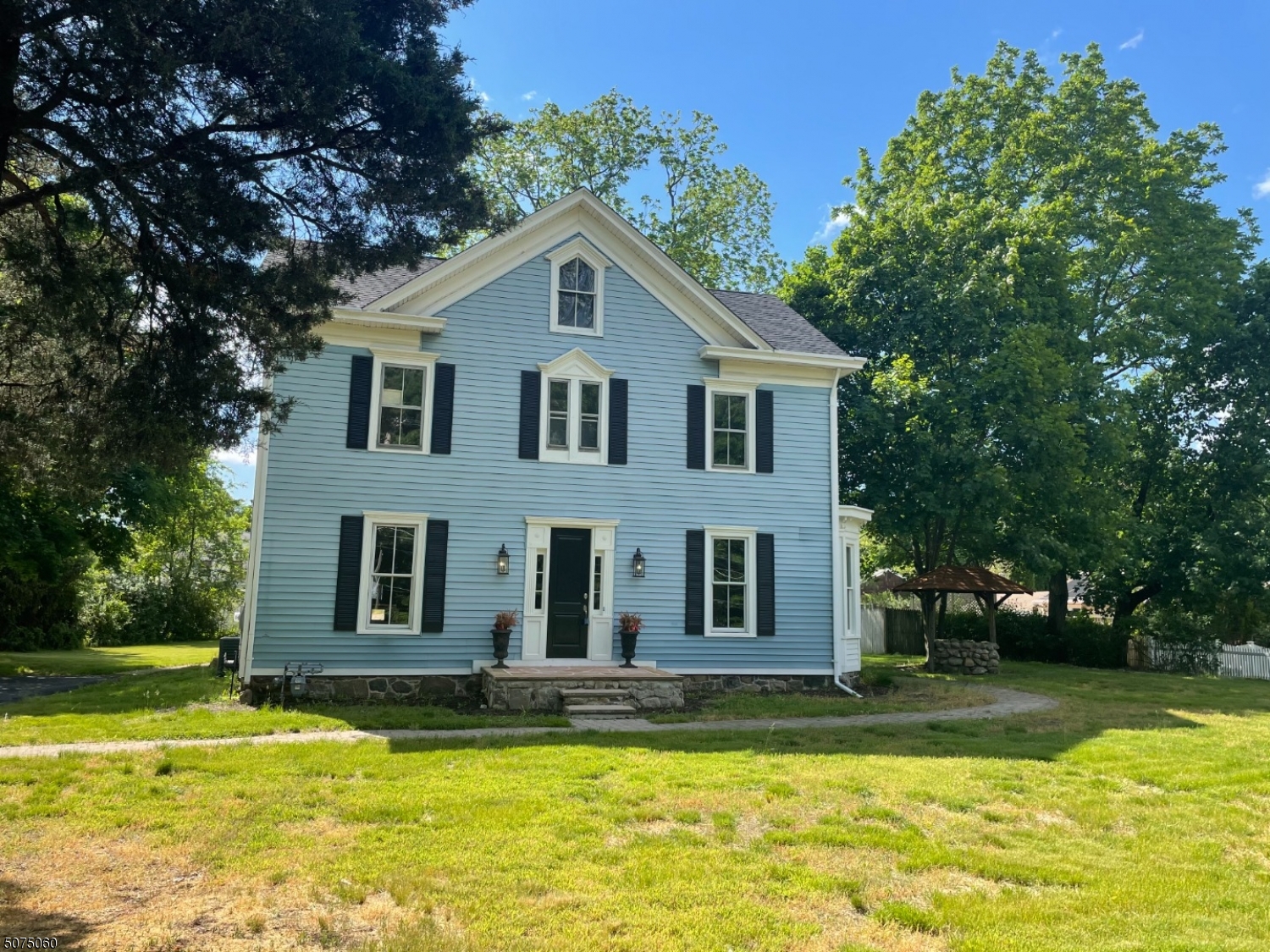 Historic Victorian home, incred maintained  recently refinished original  wide-plank floors! Work at home on first level! Plenty of space to work from home on either level. This is a masterpiece. 7" wide base molding, over size windows, you will be amazed. Continue up to the second floor with original custom wood banister, and there are 2 bedrooms, living room and separate dining room  with hardwood floating floors, and custom moldings. A kitchen with cathedral ceiling and dining area plus  sliding glass door to second story deck, which goes down to yard and gives you separate entrance for privacy. Also added is the natural gas 5 burner stove and laundry area! All this custom done! Bonus is the 12x24 barn! Over half  acre! Roof approx 2 years old,driveway 2019,1 unit a/c replaced 2 plus years ago.