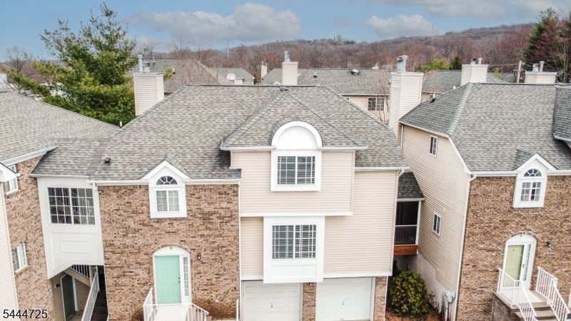 Experience the perfect blend of privacy, style, and convenience in this exceptional freestanding townhome. Filled with natural light and thoughtfully designed for modern living, this beautifully maintained home offers 2 to 3 bedrooms, 2.5 baths, and an attached two-car garage.At the heart of the home is a stunning kitchen that opens seamlessly to the spacious family room, where gleaming hardwood floors, oversized windows, and a cozy gas fireplace create a warm and welcoming atmosphere. Whether you're entertaining guests or enjoying a quiet evening at home, the open layout is both functional and inviting.Retreat to the luxurious primary suite featuring a generous walk-in closet and a spa-inspired ensuite bath designed for comfort and relaxation. The finished lower level offers endless possibilities, making it ideal for a home office, fitness room, media space, or guest area. Step outside to your private deck and patio perfect for morning coffee, outdoor dining, or simply unwinding in a peaceful setting.Ideally located just minutes from NJ Transit, acclaimed restaurants, shopping, and convenient access to Route 78, this home offers the best of suburban living with an easy commute to the city.Fireplace is being conveyed in as-is condition with no known issues. Community permits a maximum of two pets.