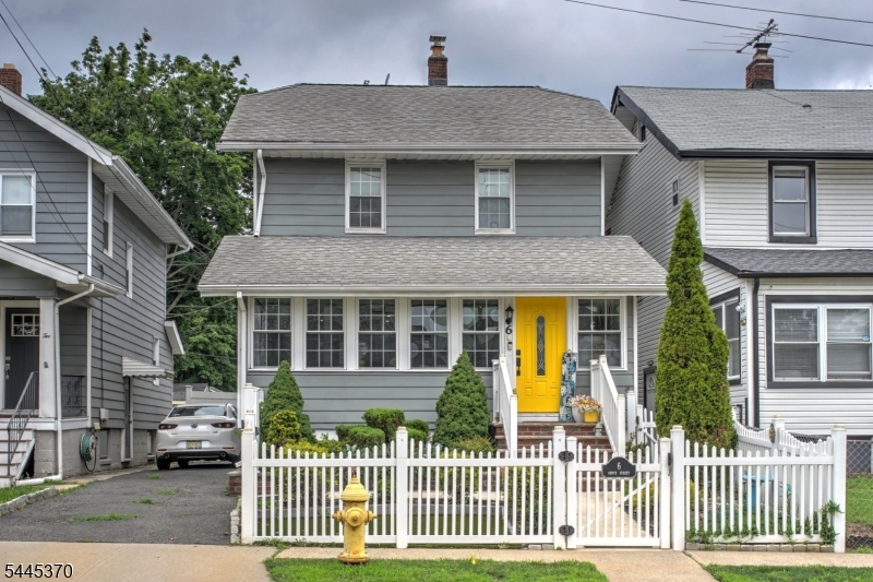 Beautifully maintained 3-bedroom Colonial offering a wonderful blend of character and modern updates. Enter through the welcoming sunroom into a bright, inviting living area featuring newer luxury vinyl flooring. The updated kitchen offers stainless steel appliances, ample cabinetry, and generous workspace, making it ideal for both everyday living and entertaining.Upstairs you'll find three comfortable bedrooms and a full bathroom that was tastefully renovated in 2025. The finished basement provides additional living space, perfect for a family room, media room, or home office, and includes a refrigerator. The TV and surround sound system are also included.Step outside to a fully fenced backyard designed for entertaining, featuring a patio, pergola, and plenty of space to relax or host in a private outdoor setting. This move-in ready home offers comfortable living inside and out.
