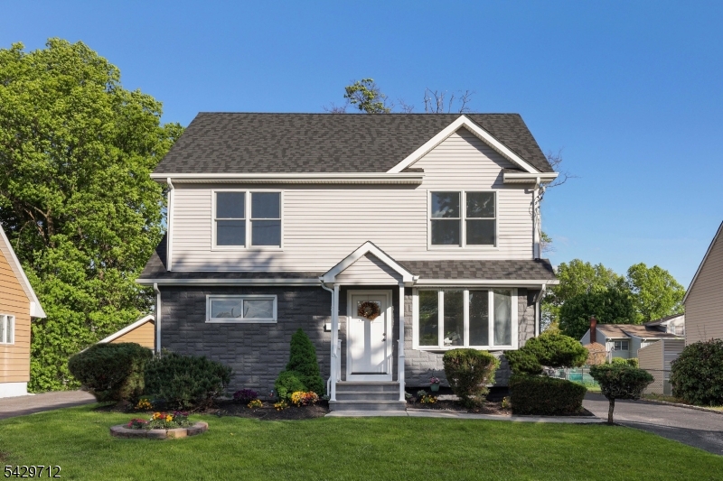 Get ready to fall in love with this sun-drenched, turn-key home on a quiet, tree-lined street in Clark! Move in just in time for summer and start enjoying everything the town has to offer, including the Clark Recreation Department and Clark Pool. Fully renovated this year, the open-concept layout offers 5 spacious bedrooms and 3 full bathrooms designed for modern living. The BRAND new chef's kitchen features soft-close white cabinetry with gold hardware, quartz countertops, stainless steel appliances and a large center island perfect for entertaining. The bright family room showcases vaulted ceilings, abundant natural light and a cozy gas fireplace. The first floor includes two bedrooms, a dining area and a full bath with a stand-up shower. Upstairs, enjoy three additional bedrooms, including a primary suite with a large closet and a stylish en-suite bath with double sinks, plus another full bathroom. Additional highlights include a spacious stand up attic for storage, a partially finished basement for work or play. All new systems throughout including Central AC, upgraded electric 200 amp service, sump pump, french drain, tankless hot water heater plus a brand new roof and siding. A detached oversized garage with lofted storage completes the package. The location is walking distance to all schools, shopping and more. This home truly has it all space, style, and comfort. Just unpack and start enjoying!