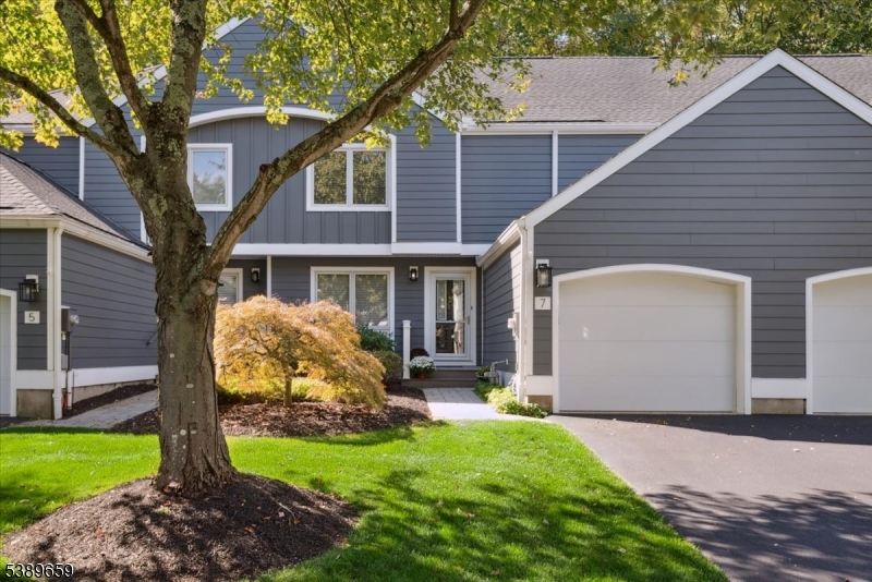 Experience refined townhome living in the prestigious Woodside community, where thoughtful design meets everyday comfort. This beautifully maintained 2-bedroom, 2.5-bath unit offers the perfect balance of comfort, space, and convenience. The main level features a bright living room with soaring cathedral ceilings, a formal dining area, and an eat-in kitchen that flows into a cozy family room with a gas fireplace. From here, step out to a private patio surrounded by mature trees and a tranquil wooded backdrop. Upstairs, a spacious loft area, along with the primary suite with a large WIC featuring two separate sections, primary bath complete with a jetted tub and separate stall shower. The 2nd bed enjoys easy access to a full hall bath, providing comfort. The partially finished basement offers a spacious recreation room, storage areas, laundry + workshop space, and utilities, offering excellent great. Residents enjoy tennis courts lined for pickleball and beautifully landscaped grounds. Perfectly situated just minutes from the vibrant downtown, where you'll enjoy an exceptional mix of fine dining, boutique shopping, cultural attractions, NJ Transit direct train to NYC, major highways ensuring effortless commuting and travel. Nearby you'll also find the Morristown Field Club, Footes Pond Nature Preserve, and top-rated Morristown Medical Center. Experience the best of low-maintenance living and vibrant suburban lifestyle in one of Morristown's most desirable communities.