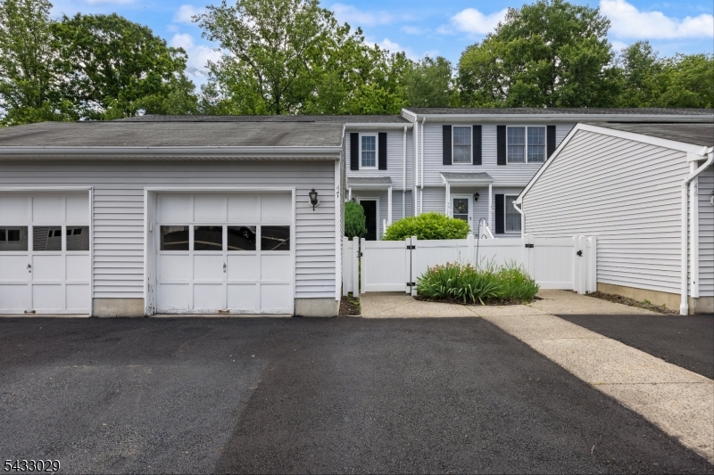 Welcome to Meadowbrook Farms, where comfort meets privacy. This beautifully maintained home features a spacious full deck overlooking serene private wooded views, creating the perfect setting for relaxing or entertaining. The finished walk-out basement provides additional living space with direct access to a patio. This versatile lower level offers endless possibilities. Nestled in the desirable Meadowbrook Farms community, this home combines peaceful surroundings with functional living spaces designed for today's lifestyle.
