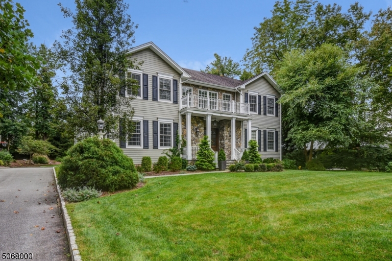 Stunning home, loaded with smart technology, set on the most desirable street in Poets' section. Substantial assessment reduction for 2020! Open layout with countless upgrades. Elegant, 2-story foyer w/sweeping staircase, 6 BDRMs, 5.2 baths. Open layout with gorgeous FDR, bright, EIK, w/custom cabinetry, high-end appliances & large island. The FR/LR is the perfect spot for entertaining w/ seamless transition to the Bluestone Patio offering a private outdoor oasis. Easy living w/3 car garage and mudroom plus access to the kitchen. W/D on 2nd floor. Full, finished basement w/high end media room, gym, guest room & large rec room complete this home. Quiet street, in the desirable Hartshorn School District. Just blocks from Gero Park.