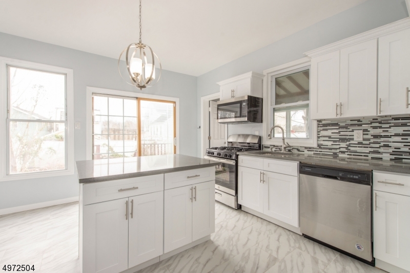 Beautifully Fully Renovated 4 Bedroom 2 Full Bath Colonial with bonus office. Updates include new flooring, cabinets counter tops, electric, plumbing, high efficient heating, air conditioning and much more.Close to all major highways for an easy commute. Schedule your appt today!!