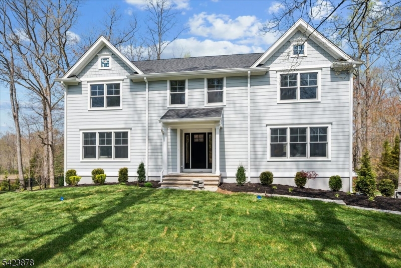 Completely renovated and move-in ready, this fully updated 6-bedroom, 5 full bath home in prestigious Wickham Woods has been rebuilt from the interior walls up with every detail thoughtfully planned out. Featuring all new mechanicals and electrical, the home offers a flexible layout including a first-floor bedroom with ensuite, two laundry rooms, and a walk-out lower level with rec room plus an additional bedroom or office with access to a full bath. The beautifully updated kitchen opens to an expansive composite deck, perfect for entertaining, while exterior highlights include Hardie siding, Andersen windows, underground sprinklers, and newly installed landscaping. A full-house generator adds peace of mind. Start your summer off right just move in and unpack!