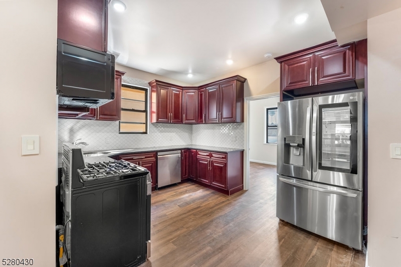 $200 Off First Months Rent when applying within 24 hours! Step into the one of a kind Upper Irvington NJ twin building apartments! A prime location, where 2 and 3-bedroom apartments await. These beautifully completely renovated spaces offer a blend of elegance and comfort. The heart of the home's kitchen space offers the allure of brand-new dark cherry cabinets with soft close features, a modern gas-burning stove, and a touch screen french-door refrigerator w/ice maker. Stay comfortable with the luxury of year-round central AC & forced heat. An elevated bathroom showcasing floor-to-ceiling wall tiles for a lavish touch. Easy commuting, conveniently located just 10 minutes from Newark Penn Station, Newark Airport, Union and Maplewood Train stations, and major highways like Route 78, Route 22, and Garden State Parkway, this property offers easy access to your daily destinations.Not only do you get to call these apartments home, but you also have access to a shared outdoor included amenity space complete with lounge seating and grills for entertaining. It's the perfect place to unwind and relax right at your doorstep.