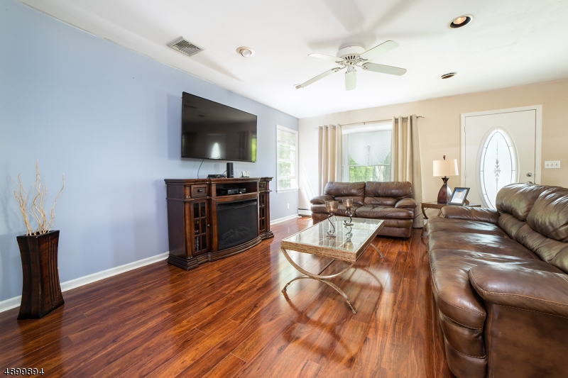 Beautiful 3 Bed 2 Bath Colonial on Corner Lot. Heated 4 Season Room with Pellet Stove that Leads out to the patio and in ground pool for summer fun. Close to Lake Hopatcong for boating, swimming, and many restaurants. This home is a must see.