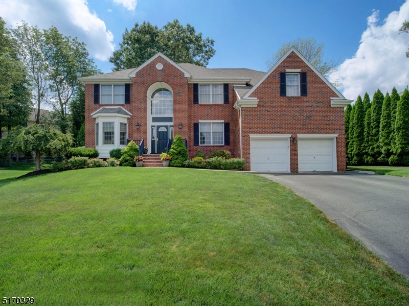 GORGEOUS 4 BEDROOM, 3.5 BATH COLONIAL LOCATED AT THE END OF A CUL-DE-SAC.  BEAUTIFUL PAVER PATIO & TREE-LINED BACKYARD. ENTER INTO THE 2 STORY FOYER WITH PALLADIUM WINDOWS, FIRST FLOOR DEN OR OFFICE, SPACIOUS KITCHEN WITH GRANITE COUNTERS, STAINLESS STEEL APPLIANCES, BUMP OUT BREAKFAST NOOK AND FRENCH DOORS LEADING TO THE PRIVATE OASIS BACKYARD. ADJACENT TO THE KITCHEN IS THE TWO STORY FAMILY ROOM WITH WOOD-BURNING FIREPLACE.  MAPLE WOOD FLOORS AND BEAUTIFUL CROWN MOLDING THROUGHOUT. ON THE SECOND FLOOR YOU'LL FIND A LOVELY MASTER EN SUITE, WITH 2 WALK-IN CLOSETS, FULL BATH WITH DUAL SINKS, SOAKING TUB & SHOWER STALL.  THREE OTHER BEDROOMS COMPLETE THE FLOOR, WITH ONE BEDROOM INCLUDING A BONUS ROOM WITH PASS THRU TO ANOTHER BEDROOM.  THE BASEMENT IS FULLY FINISHED AND INCLUDES A 42" X 12" REC ROOM WITH WET BAR, FULL BATH WITH SHOWER STALL, EXERCISE ROOM, OFFICE & STORAGE. LARGE & EASILY ACCESSIBLE GARAGE LOFT FOR ADDED CONVENIENCE,  PUBLIC UTILITIES HERE. A MUST SEE YOU DO NOT WANT TO MISS!