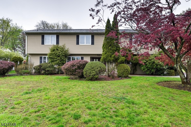Welcome home to your over 4000 square foot house, where you will have all comforts and luxury you desire in this well established neighborhood. This large beauty sits perfectly on over a third of an acre lot which features manicured grounds and a fenced in private yard to create your own oasis. There are many access features into the home where you will find a great layout with a flexible floor plan that is sure to impress and accommodate everyone's needs.. The main house has 4 bedrooms, 2.5 baths living room, family room, eat-in-kitchen, dinning room, and a large semi finished basement. There is a 2 floor large in-law suite which has 2 possible bedrooms, 1.5 baths, living room, dinning room, and kitchen. There is plenty of parking with a long two car wide driveway and two car built in garage. Walking distance to schools and nearby house of worships, parks, shops, and stops. Make this a must see and it won't disappoint.