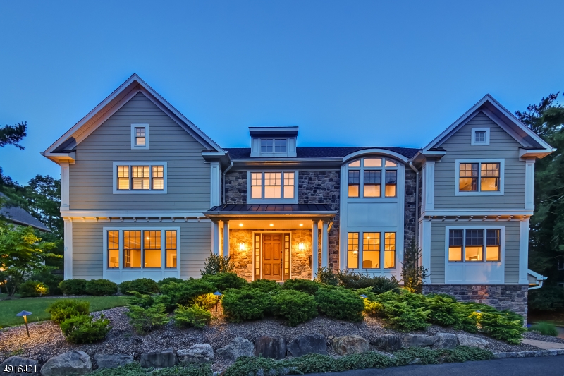 Ideally located on .52 acres of stunning property on a quiet street walking distance to highly rated Deerfield Elementary School (just .3 miles!), this custom built Colonial - new in 2013 - features every upgrade, new saltwater pool, hot tub, outdoor kitchen & fire pit. Grand 2 story Entrance Hall, 10' ceilings on 1st floor, open floor plan, Chic NYC style, huge gourmet eat-in kitchen with Viking & Subzero appliances & massive center island totally open to family room with gas fireplace flanked by custom bookcases, coffered ceiling, easy 1 step access to patio. It has very private property with swing set surrounded by mature trees! 1st floor In-Law Suite! Luxurious Master Suite with 3 WICs, spa-like master bath + 3 bedrooms & 2 baths & laundry on 2nd flr. Finished LL with rec room & nanny suite. Generator!