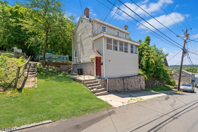 Don't miss this opportunity! Set in one of Paterson's most desirable residential neighborhoods, this property offers a rare combination of space, convenience, and opportunity. The oversized lot provides exceptional flexibility for outdoor enjoyment today while offering future possibilities for those looking to maximize the property's potential. Live and entertain with ease as the home offers: an open-concept living and dining area, an oversized kitchen with ample space for gathering, generous outdoor deck space, off-street parking, and a layout designed for comfortable everyday living. Whether you're looking for a place to call home or exploring long-term possibilities, this property delivers value in multiple ways.  Located close to schools, parks, shopping, transportation, and major highways, the setting and oversized property make this a unique opportunity. Schedule your private tour today.