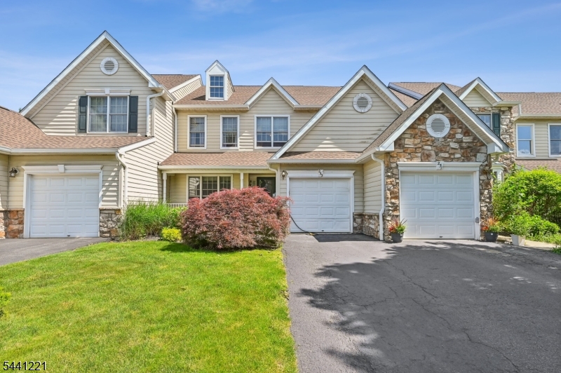This exceptional townhome offers three levels of beautifully finished living space, including a fully finished basement that adds more than 800 square feet of versatile living area. The open-concept floor plan is designed for both comfort and entertaining, featuring a spacious eat-in kitchen with abundant cabinetry, generous counter space, and direct access to a private paver patio.The kitchen flows seamlessly into the inviting family room, highlighted by a cozy gas fireplace. Nine-foot ceilings on the main level enhance the home's bright and airy feel, while elegant crown molding and custom trim work add sophistication throughout.The luxurious primary suite features a dramatic cathedral ceiling, a walk-in closet, and a spa-like bath complete with a soaking tub and separate shower. All bedrooms are generously sized and outfitted with custom California Closets for exceptional storage and organization.The finished lower level provides outstanding flexibility, offering a large recreation room, a dedicated office or fitness area, and two separate storage rooms.Move-in ready and meticulously maintained, this home is ideally situated near major highways, top-rated schools, shopping, dining, recreational facilities, and Newark Liberty International Airport, making it an ideal combination of luxury, convenience, and lifestyle.