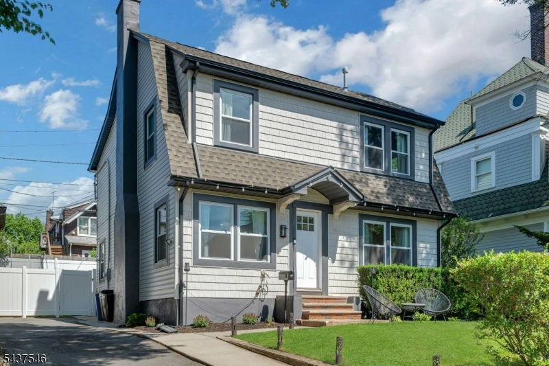 Perfectly situated between two train stations, this completely renovated, sun-filled home offers 4 bedrooms and 2 full plus 2 half baths. Designed for today's lifestyle, the open-concept main level features a spacious living room with French doors opening to the backyard, a chef's kitchen with stainless steel appliances, quartz countertops, and custom cabinetry, a formal dining room, private office, and stylish powder room.  Upstairs, the primary suite boasts a beautifully renovated en-suite bath, complemented by three additional bedrooms and an updated hall bath. The expansive full-size basement provides abundant flexible space, perfect for a home gym, recreation room, media room, or additional living area. Major improvements include central air, new electric, plumbing, roof, and siding. The finished basement provides excellent recreation space and an additional renovated powder room. Located in a highly desirable neighborhood with top-rated schools, just steps from both Walnut Street and Bay Street stations, offering direct service to NYC and Hoboken. Btw, although close to the train stations feel free to stay awhile and you will never hear a train. The best of both worlds!