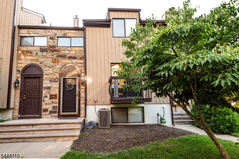 Welcome to this beautifully renovated 2-bedroom, 2.5-bath contemporary townhome in the desirable Hastings Square community. Thoughtfully updated in 2020, this immaculate three-story home offers a spacious and versatile floor plan designed for comfortable living and entertaining. The main level features a formal living room, elegant dining room with a cozy fireplace, and a bright, modern kitchen. Step outside onto the private deck overlooking a peaceful hillside the perfect place to enjoy your morning coffee or unwind in the evening. The upper level offers three generously sized bedrooms, including a spacious primary suite, while the lower level boasts a large family room and a home office area could be used for gym. With its modern style, exceptional condition, and desirable location in Hastings Square, this move-in-ready home is one you won't want to miss!