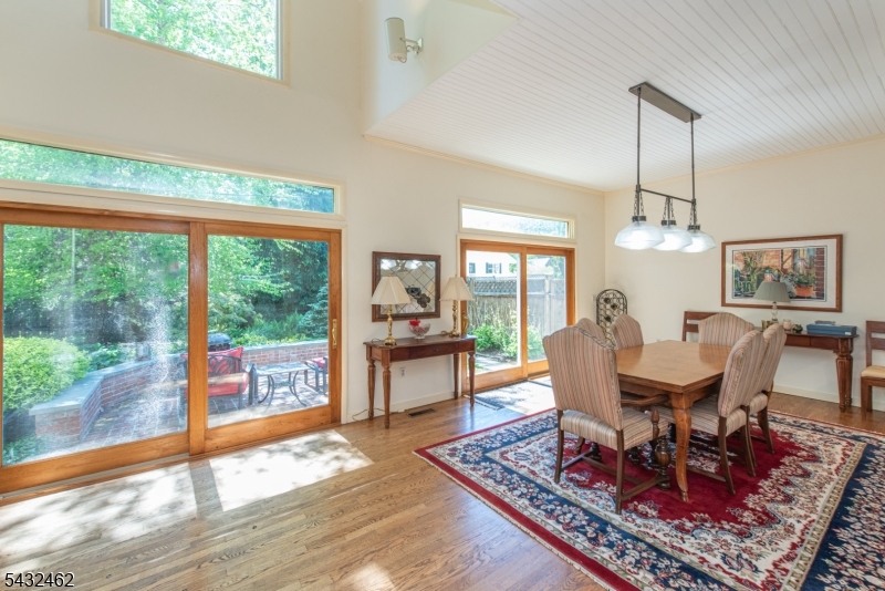 A unique Carriage Home in the heart of Morristown's Historic District. The highlight of the home is its expansive open-concept updated kitchen, living, and dining area. Custom windows and glass doors flood the space with natural light, providing views of the private garden oasis outside. This serene outdoor garden area serves as a perfect retreat, enhancing the home's appeal. With its prime location and timeless design, this home combines modern living with the tranquility of times past, making it an ideal choice for those seeking a blend of convenience and charm in Morristown.