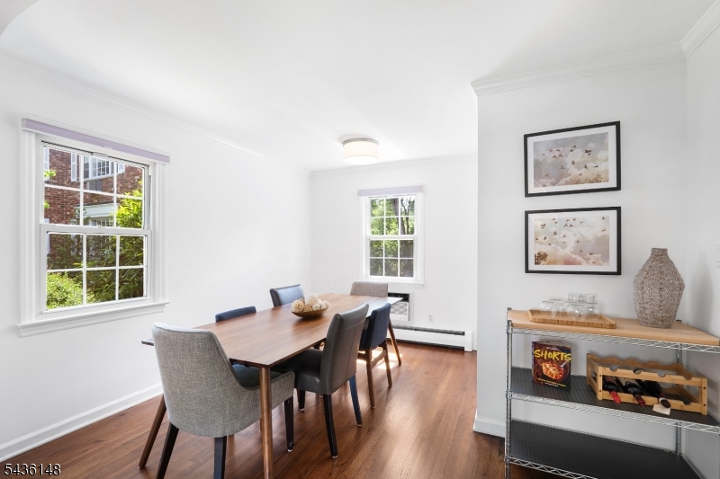 Move right in to this impeccably maintained home and enjoy a short walk to the center of town and enjoy all that Bernardsville has to offer; restaurants, shopping and NJT train. This end unit features gleaming hard wood floors throughout the main living space and bedrooms as well as newer Pella windows. The sunny and bright first floor includes a spacious living and dining room with built in wall air conditioning unit installed in 2021. The modern kitchen and powder room, updated in 2023 include new stainless steel appliances, cabinetry with soft close drawers and quartz countertops.  The second floor includes 2 generously sized bedrooms and newly renovated bathroom in 2023. The lower level, tiled with luxury vinyl plank flooring,  allows access to the entrance from the garage as well as laundry and area for storage and home gym equipment if desired.  The exterior includes an additional parking spot as well as access to a common yard for recreation. This Anderson Brook Condo is one of four units in a charming brick complex near the center of desirable Bernardsville. All offers due by 5PM on Sunday June 7th.