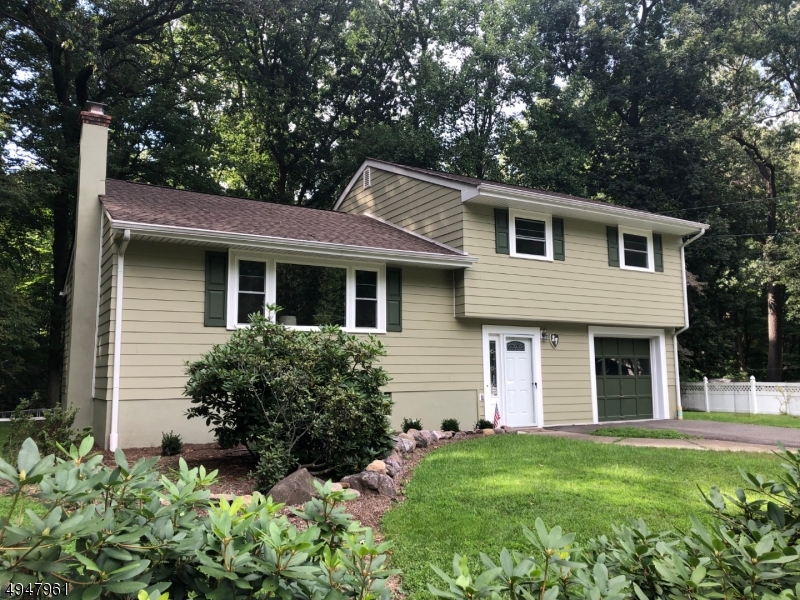 Beautiful, clean, well maintained house ready to be occupied! Sits in a Cul De Sac on a quiet residential street! Many newer updates to the home: Newer concrete board siding, roof, and windows. Boiler/water heater and furnace replaced in 2019. Hardwood floors in living room, dining room, hall, and bedrooms. personalize your dream kitchen! Great local schools! Close to major highways: Rt 80, Rt 287, and Rt 10. Approximately two miles away from Morris Plains Train Station. A commuter's dream! Large backyard where you could spend your staycation or for entertaining! Very close to shopping centers, dining areas, and other services. Endless possibilities in this getaway within town!
