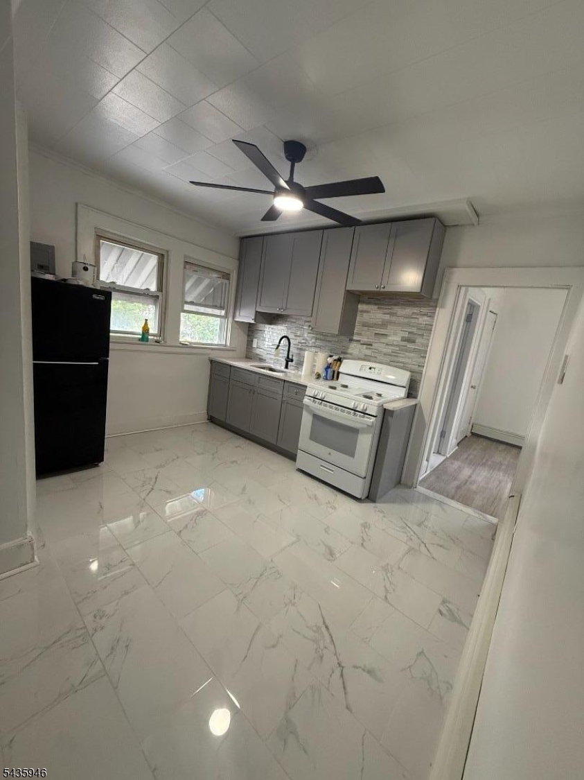 Welcome to your next home! This beautifully renovated 3rd floor apartment offers 2 bedrooms and 1 renovated bathroom. brand new flooring along with living with a separate updated kitchen with quartz countertops. The home offers plenty of closet space as well as additional pantry space. 1 parking space is available. Located on a quiet tree-lined street in East Orange, 85 Sunnyside Ter. combines comfort and convenience.The home is located within walking distance to NJ Transit trains to NYC and with easy access to the GSP and I-280 for an easy commute.