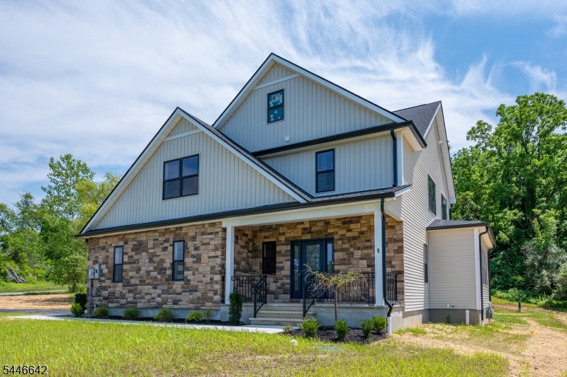 Brand new construction home in Hardyston offering a main-level primary suite, open-concept layout, designer kitchen, spacious living areas, and a fully finished basement with bath. Upstairs includes additional bedrooms and a versatile loft, ideal for a home office, den, or flex space. The home backs to many acres of preserved land, creating a scenic and private backdrop. Enjoy a lifestyle surrounded by golf, resort amenities, dining, outdoor recreation, and beautiful natural scenery, all while remaining convenient top-schools, shopping, and everyday needs. Located across from Ballyowen Golf Club and near Crystal Springs Resort and convenient to Route 23, Route 94, This home offers comfort, style, and a setting that makes everyday living feel like a retreat. Schedule your In-Person or Virtual Showings now. Taxes listed do not reflect the completed home. Property has not yet been fully assessed. Buyer to verify future taxes with the municipality/tax assessor.