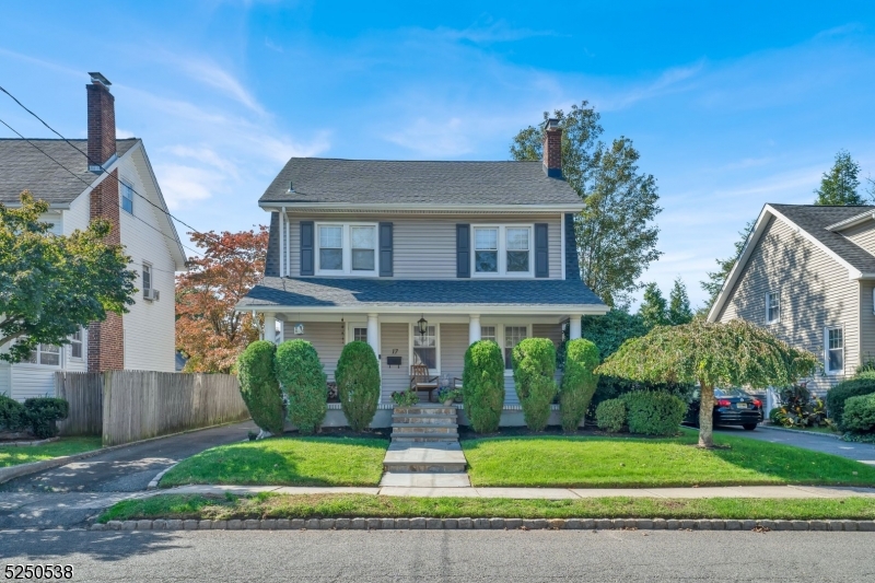 Welcome Home! This beautifully renovated Colonial located in the heart of Springfield, offers the perfect blend of modern living and classic charm. With 3 bedrooms/2 baths, this home is situated in close proximity to Downtown Springfield, Baltusrol Golf Club, numerous parks, and various transportation options for commuters. As you enter through the front porch, you'll be welcomed into the bright and inviting Living Room, where hardwood floors and a cozy wood-burning fireplace set a warm and welcoming ambiance. The modern Kitchen, remodeled in 2018, boasts stunning white shaker cabinets, elegant crown molding, nickel finishes, and a reverse osmosis water purifier, while overlooking the Dining Room. Completing this level is a spacious Family Room, perfect for relaxing, and a Full Bath. The fully finished Basement is a perfect flex space and offers ample storage, a washer/dryer, and an office area for those working remotely. The 2nd level host 3 Bedrooms and a Full Bath. The Primary Bedroom accommodates a King-size bed and has ample storage with beautiful built-in wardrobe and a walk-in closet. The 2nd bedroom features built-in wardrobes as well & the 3rd bedroom offers access to the unfinished Attic. Seller is providing architecture plans for the attic, offering the potential for expansion. Updates include: New Roof 2021, Furnace 2019, Kitchen 2018, see media for more. Enjoy entertaining on the wood deck (2022) or evenings around the fire pit (2022). This home is a MUST SEE!