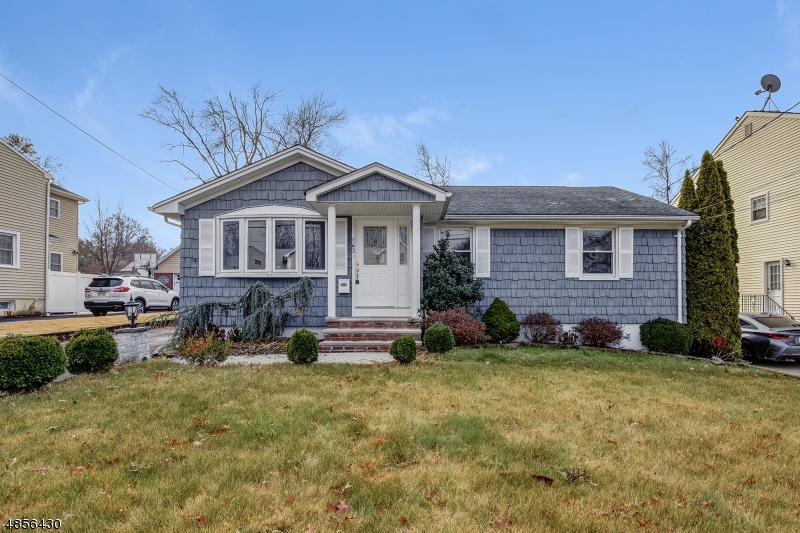 STOP THE CAR! 2018 FULLY RENOVATED HOME, w/ gleaming hardwood floors, updated SLEEK kitchen, elegantly chic bathrooms, and FULLLY finished walk-out basement, in-ground pool, outdoor kitchen, and more! Upon entering, the airiness of this open floor plan, w/ abundant natural light immediately welcomes you home. Holidays are special in the gorgeously updated kitchen w/sleek subway tiles, NEW SS Appliances & quartz counters, open to the over sized dining. Sliding glass doors bring you to a beautiful patio w/ in-ground pool, outdoor shed, & built-in grill for outcooking! Everyone will love hanging out in the fully finished basement w/ party bar! Large private office w/ natural sunlight. Oversized garage can fit 2 cars, or makes a great workshop! Close to NYC Transit, major highways & shopping & more! Will not last!