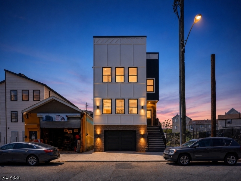The new construction game has leveled up and you don't want to be left behind. This stunning brand new build, crafted by one of the town's most reputable developers. The ground level features a half bath and large space and offers both a side entrance and garage access. Each unit boasts 3 bedrooms and 2 full bathrooms, including a private primary suite, plus its own laundry area. Second floor unit and top-of-the-line finishes throughout quartz countertops, premium cabinetry, and two unique kitchen designs to choose from. Best of all, this property qualifies for a 5-year tax abatement. Don't miss the chance to see it today! Each property will have its own backyard and will be fenced off. With a total of 6 bedroomns 4.1 bathrooms, this is it!
