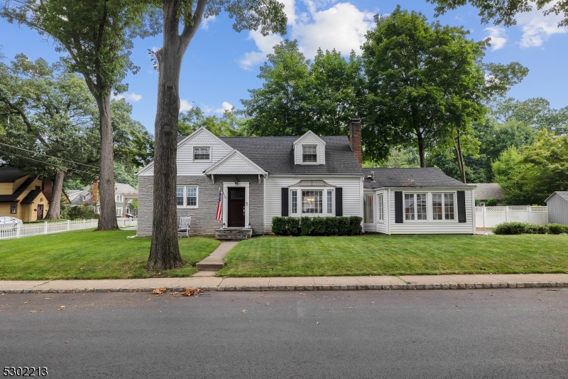 Stunning custom cape located in the Washington Headquarters section of Morristown.  Gorgeous center island eat-in renovated kitchen with ceiling height white cabinets, recessed lighting, quartz countertops and professional grade stainless steel appliances, including drawer microwave, reverse osmosis & touch activated faucet. Harwood flooring throughout, 1st floor includes family room with woodburning stone fireplace, 2 bedrooms and full bath, with a 4 season sunroom adjacent to the heated 2 car garage.  Upstairs boasts 3 bedrooms with a recently updated full marble bath with radiant heat and rainfall shower. Partially finished basement includes dry bar, built-in shelves and tile flooring. White vinyl fencing line the manicured yard, large outdoor patio, fire table and pergola.  Underground sprinkler system and shed complete this completely renovated move in ready home. Home also features a whole house filtration system; Conveniently located minutes from the Midtown Direct train station, routes 24 and 287, and walking distance to downtown Morristown's outstanding restaurants and night life.  Professional architecture plans for second floor addition valued at $7K included in sale.