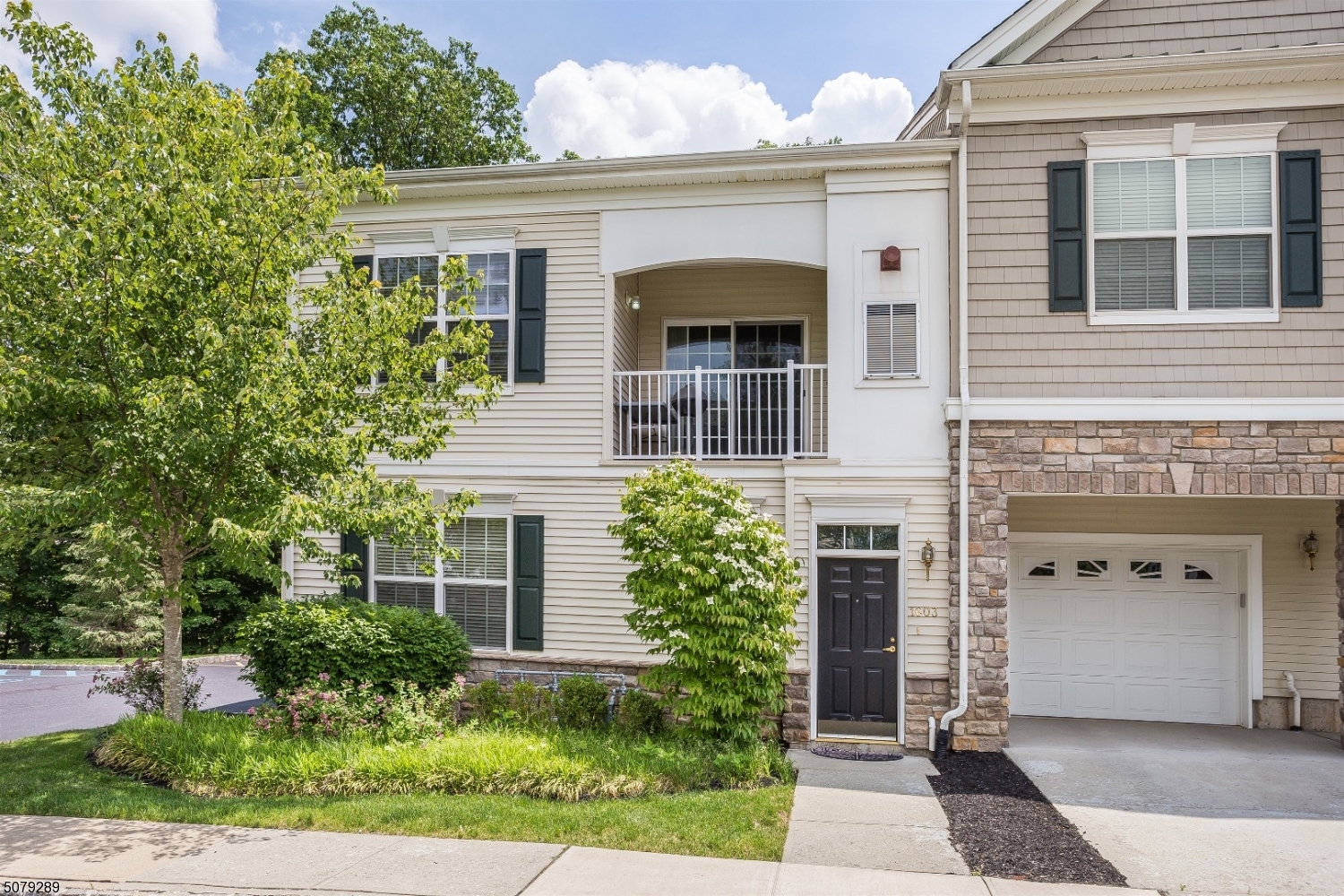 Beautiful light-filled 2BR/2BA townhouse style unit in The Grande in the Whippany section of Hanover Township. Hardwood floors throughout. Features cathedral ceilings in the living room, granite counter tops & stainless steel appliances in the kitchen. Balcony off the sliders in the dining room. Second bedroom, full bath with laundry complete the the main level. Private master suite is off the loft hallway on the second floor. Spacious custom walk-in closet & full bath. Attached garage. Enjoy the community's club house with the pool, gym, billiards & party room. Easy access to major highways, train stations and downtown Morristown.
