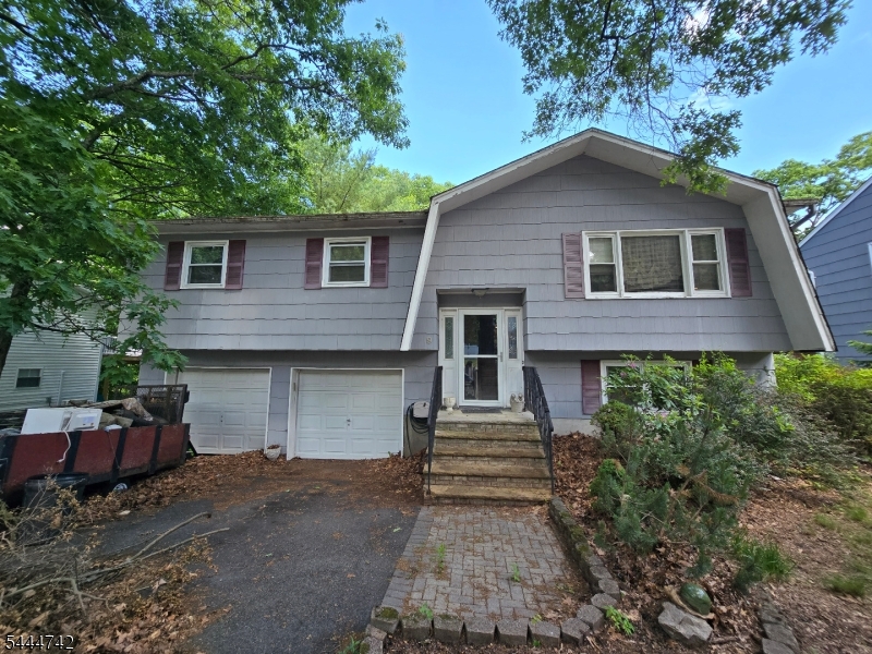 Rehab Opportunity---4 BR 2.5 BA house in need of updating---This home has great bones and is .5 miles from the water---Perfect for handy home owners who would like to remodel their home in their own style or for investors and contractors looking for opportunities---The bones of the house are solid and the lower level was remodeled in June of 2025---the majority of the house could use some refreshing---House will be sold As-Is---Buyers responsible for all their own Due Diligence---Wonderful home awaiting it's next chapter.