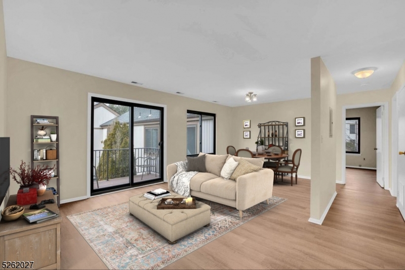 Lovely one floor unit with no one above. Well maintained, clean and shows nicely.  Balcony/deck from living room sliders. Laundry inside unit, washer and dryer included.  Basement storage room.  New laminate floors, freshly painted, renovated bath; AC unit does not work and sold as-is.