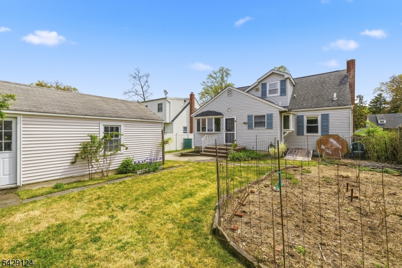Welcome to Maywood! Located on a desirable street in close proximity to modern day conveniences, sits this spacious 3 bedroom 2 bath Cape Cod. Featuring a welcoming bluestone framed garden bed and front steps, enter into an open and spacious living room and dining room with each room boasting triple picture windows and loads of morning and afternoon light. A kitchen with pantry closet and skylight also features a deep spilled window perfect for growing an indoor herb garden!  A king size bedroom and updated full bathroom round out the first floor. Don't miss the closet with convenient first floor laundry.  Upstairs a king size bedroom with TWO double closets and built-ins on one side and another spacious bedroom with two more enormous double closets is a welcomed surprise! Another full bathroom is located upstairs!  A full unfinished  basement provides adequate storage or serves as a clean slate to finish off for a rec room, gym, home office, etc. Out back is a small SUV sized 1 car detached garage and yard. Freshly painted, central air, and solar panels ensuring low electricity costs, don't miss this gem!