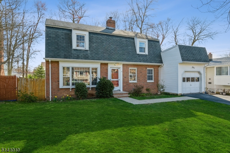 First time on the market! HARDWOOD FLOORS RUN UNDER ALL CARPETING THROUGHOUT THE HOUSE. Who doesn't love a brick house? This adorable 5 bedroom home has fantastic curb appeal and is just waiting for you and your imagination to make it perfect. First floor offers large living room with huge picture window, dining room, eat-in kitchen,   bath with laundry, and bedroom/den. Move laundry to basement and create a second full bath or master suite. Garage enters into kitchen for added comfort in bad weather and sliding doors out to back yard makes it easy for outdoor entertaining. Upstairs offers 4 more bedrooms with great closet space and a full bath. Basement is large and could be repurposed for other use, expanding the living space of the home. The potential is endless and with updating it will be the best on the block.As per OPRA furnace replacement 2017.
