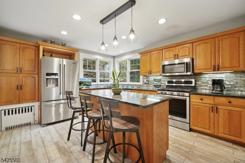 WELL BOOKED SHORT-TERM RENTAL PROPERTY! Turnkey, fully furnished income-producing Airbnb 4.79 rating & VRBO with a proven 6+ year track record. Cozy Colonial offers 3 bedrooms hosting 6 guests, 1 full and 3 half baths & is ideally located in sought-after Upper Montclair, just 3 blocks to the NYC direct train and minutes to major 2026 "once-in-a-lifetime  events including MetLife Stadium FIFA World Cup (15 min), US Open, July 4th/Macy's Fireworks, Sail4th 250 driving strong yr-round & peak demand rates creating meaningful upside in annual revenue. Exceptional opportunity with consistent income, high occupancy, and minimal overhead. The property generates approximately $169,584 in annual gross revenue from Airbnb, VRBO, and private bookings. With approximately 80% occupancy (40+ weeks) and a $587 per day average rate, it delivers a strong Net Operating Income (NOI) of approximately $140,244. Home features modern updates including hardwood floors, wood fireplace, updated kitchen, 3-season Florida room, leading to a gorgeous, private backyard. Direct access to Mills Reservation (157 acre park) offers scenic trails and NYC skyline view. A major guest draw. A rare and valuable addition to any portfolio, this income-generating property offers immediate cash flow in one of New Jersey's most competitive and desirable locations.