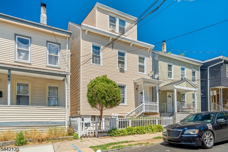 Great two-family opportunity in Paterson featuring two units with flexible living space. One unit offers 2 bedrooms and 1 bath, while the second unit provides 4 bedrooms and 1 bathrooms. New updates throughout the property, offering flexibility for owner-occupants or investors. Additional features include an unfinished basement suitable for storage and a nice-sized backyard. Conveniently located near local amenities and transportation.