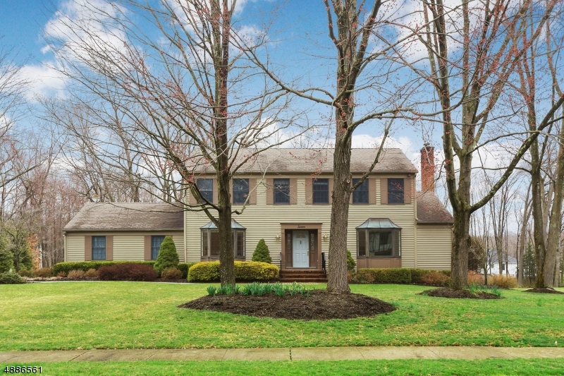 Beautiful private property in desirable section of Morris Township. Spacious 4 bedroom, 2.1 bath colonial with updates throughout. Light-filled eat in kitchen boasts stainless steel appliances, granite countertops and tiled backslpash. Laundry room and garage entrance are located off the kitchen for added convenience. Entertain on the expansive trex deck during the warmer months. Ascend the stairs to the master bedroom with sitting room. The master bath has been updated and features a walk-in closet with organizers. Move right in to this great neighborhood!