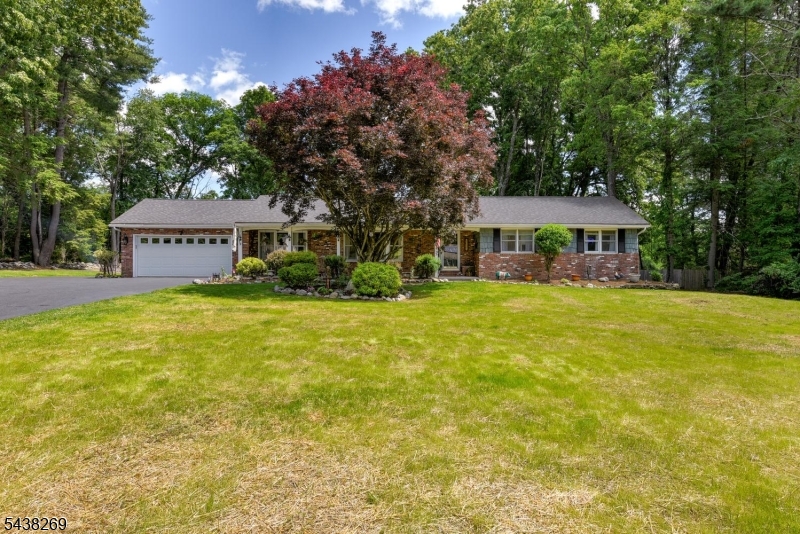 METICULOUSLY MAINTAINED RANCH ON 3/4 ACRE OF PARK LIKE PROPERTY WITH A 40x30 POLE BARN!! Offering nearly 2,000 square feet of living space and a BRAND NEW 4 BEDROOM SEPTIC system, this move-in-ready home combines comfort, functionality, and versatility. The oversized living room provides an inviting gathering space, while a Murphy bed offers a convenient accommodation for overnight guests. The kitchen features a large bay window overlooking the peaceful, flat backyard. A generous dining room complete with a wine refrigerator and French doors that open to the deck, create an ideal setting for indoor/outdoor entertaining. Tons of natural light throughout. The primary suite includes a versatile bonus area that can be used for multiple things, or serve as a walk-in closet. Pass through to the freshly updated primary bathroom. You will also find 2 additional bedrooms and full bath. As an added bonus, the property features an impressive 40' x 30' pole barn with 70-amp service, fully insulated and sheetrocked, offering endless possibilities for hobbies, storage, a workshop, or recreational use.Additional highlights include Central Vac, 4 YEAR OLD ROOF, along with numerous updates and upgrades throughout the home.